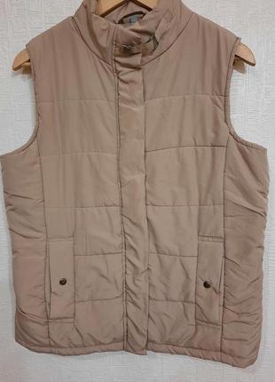 Жіноча жилетка