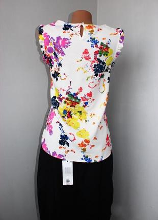 Блуза / кофточка / топ біла в принт різнокольорових квітів / з рюшами, румунія, 83 фото