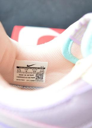 Кроссовки выполнены в светло-розовом и фиолетовом цветах9 фото