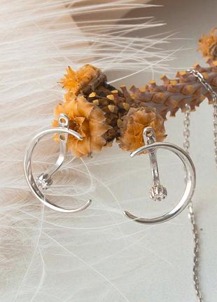 Срібні сережки пусети місяць з одним білим фіанітом посередині