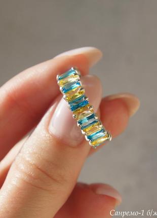 Серебряное кольцо дорожка с желтыми и голубыми камнями4 фото