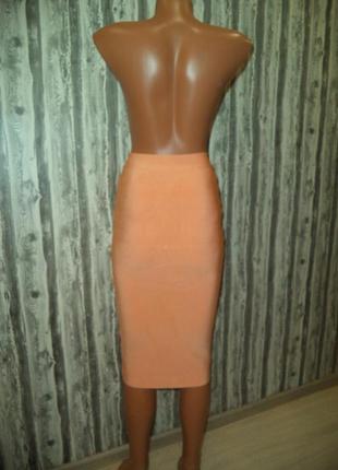 Бандажная юбка карандаш абрикосового-оранжевого цвета7 фото
