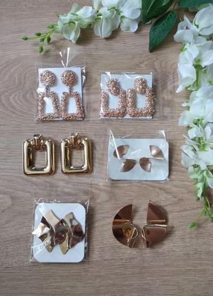 Стильные металлические серьги гвоздики.