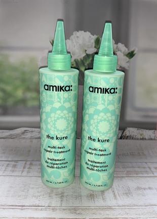 Средство для восстановления поврежденных волос amika the kure multi-task repair treatment,