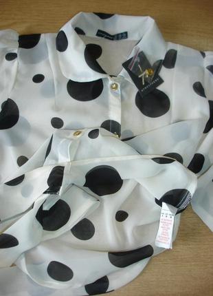 Короткая блуза в  горошек на пуговицах (с бантом снизу )  atmosphere    мадрид5 фото
