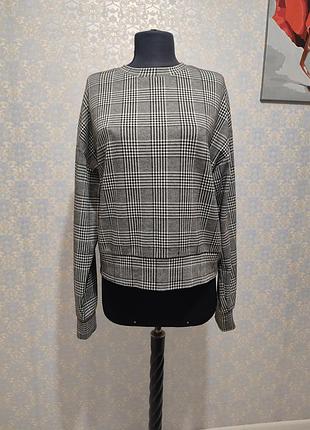 Вкорочена кофта в клітинку