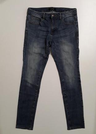Фірмові джинси