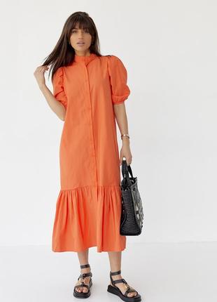 Женское длинное платье на пуговицах с оборкой по низу.1 фото