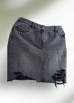 Рвана джинсова юбка