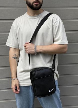 Классическая черная мужская сумочка через плечо nike7 фото