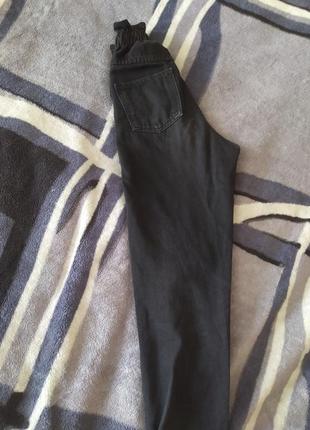 Черные джинсы с резинкой на талии7 фото
