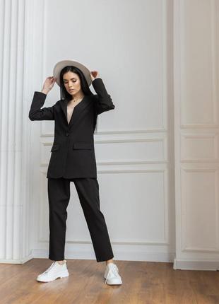 Костюм брючный женский с пиджаком цвет черный1 фото