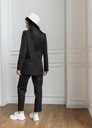 Костюм брючный женский с пиджаком цвет черный6 фото