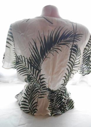 Блузка  с v-образным вырезом из крепированной ткани.6 фото