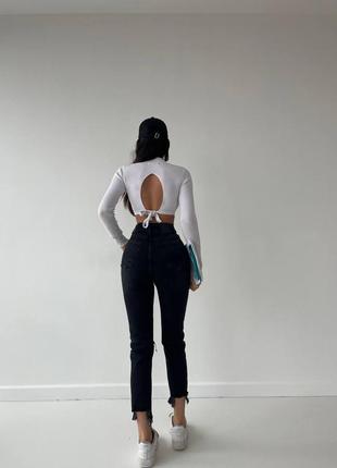 Трендовые базовые джинсы с порезами и рваные снизу3 фото