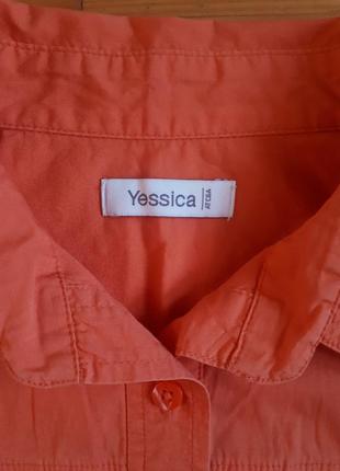Рубашка оранжевого цвета с коротким рукавом4 фото