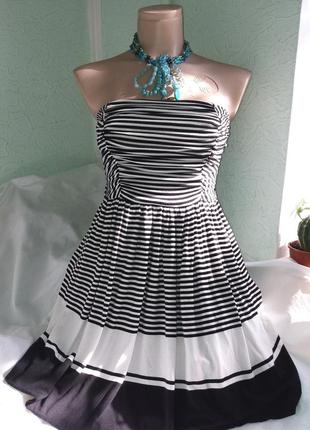 Чудове плаття-бюстьє в чорно-білу смужку з кишенями,40-44разм.1 фото