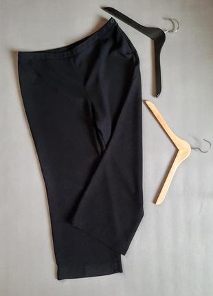 Базовые черные широкие брюки в крапинку1 фото