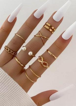 Модні стильні трендові золотисті колечка набір колечок перстенів кілець каблучок колечко з перлинками фалангові кільця