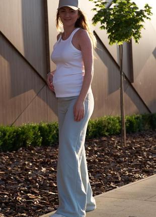 Широкі штани для вагітних з еластичною вставкою для животика м'ятні4 фото