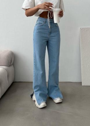 Джинсы голубые с разрезами
