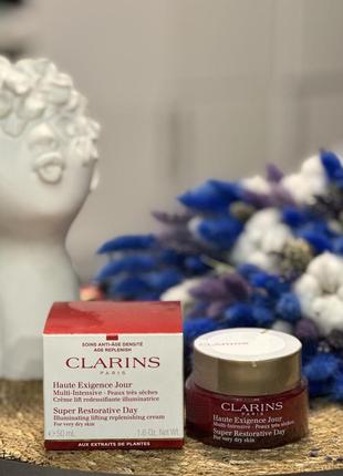 Денний відновлюючи крем clarins super restorative day haute exigence jour1 фото