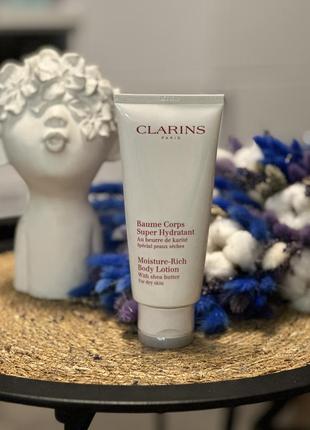 Увлажняющий лосьон для тела clarins moisture-rich body lotion baumé corps super hydratant