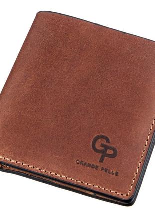 Компактное портмоне унисекс с накладной монетницей grande pelle 11238 коричневое1 фото