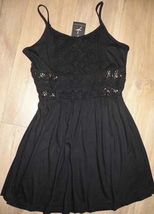 Маленьке чорне плаття з перфорацією atmosphere
