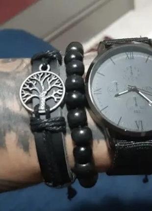 Подарунковий набір для чоловіків: наручний годинник з 4 стильними браслетами - діам. 4 см, довж. 24 см, шир рем 2 см, без коробки.2 фото