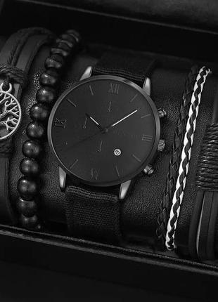 Подарунковий набір для чоловіків: наручний годинник з 4 стильними браслетами - діам. 4 см, довж. 24 см, шир рем 2 см, без коробки.1 фото