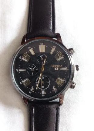 Подарунковий набір для чоловіків: наручний годинник з 3 стильними браслетами - діам. 4 см, довж. 24 см, шир рем 2 см, без коробки.4 фото