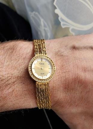 Calinda, изысканные золотистые часы с браслетом9 фото