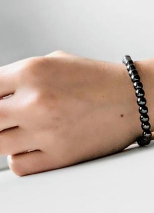 Браслет из натурального камня гематит. размер сфер 6 - 8 мм, длина обхвата 18 см
