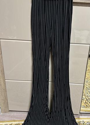 Трикотажные брюки, лосины клеш 34 размер