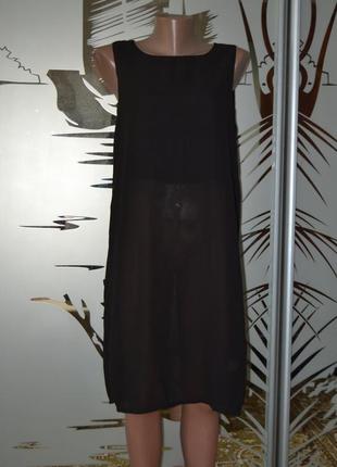 Длинная блузка с разрезом на спинке