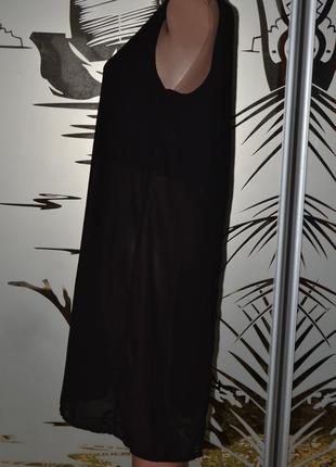 Длинная блузка с разрезом на спинке