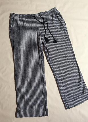 Стильні бриджі капрі льон в смужку великий розмір з пензликами
