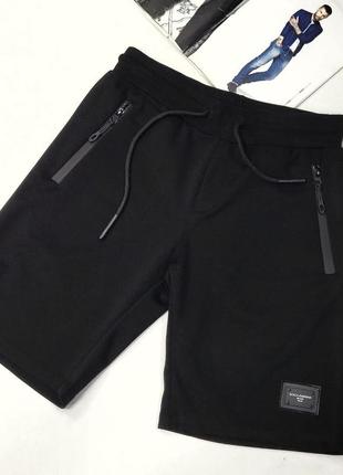Мужские трикотажные шорты черного цвета1 фото