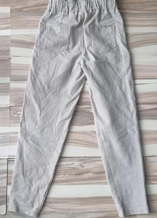 Бежевые брюки-джоггеры на резинке4 фото