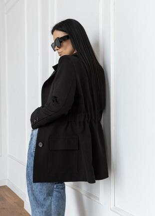 Піджак жіночий однобортний із накладними кишенями, дизайнерський, чорний1 фото