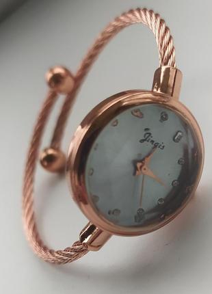 Годинник наручний жіночий з еластичним браслетом1 фото