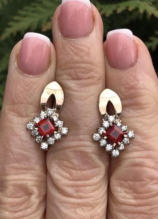 Сережки срібні із золотом і гранатом 212/г з