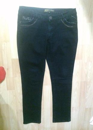 Фирменные джинсы