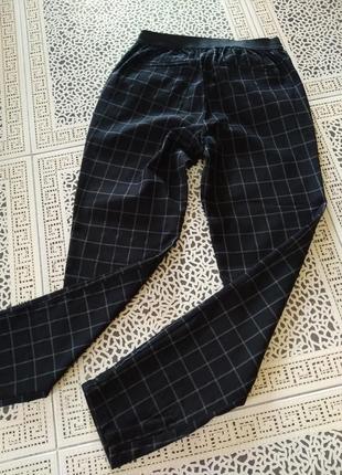 Женские стрейчевые брюки в клетку от gloria jeans 👖7 фото