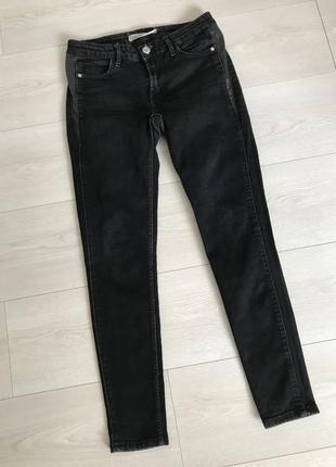 Черные джинсы со вставками