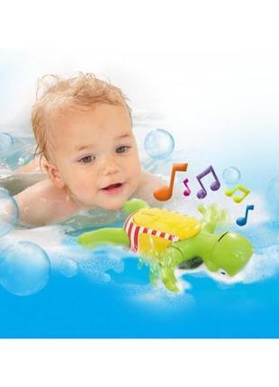 Іграшка для ванної toomies черепаха плаває та співає (e2712) ll7 фото