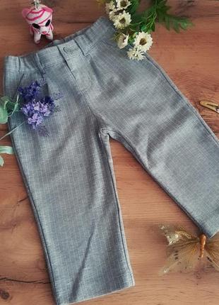 Штани на дівчинку сірі в тонку смужку