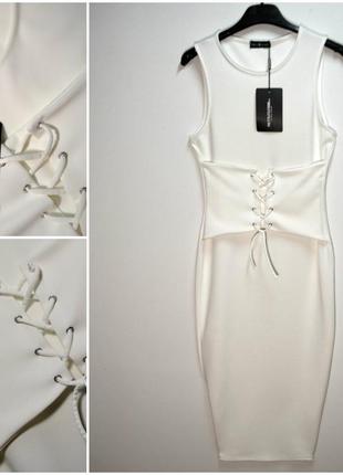 Эксклюзивное белое платье с корсетом по талии1 фото