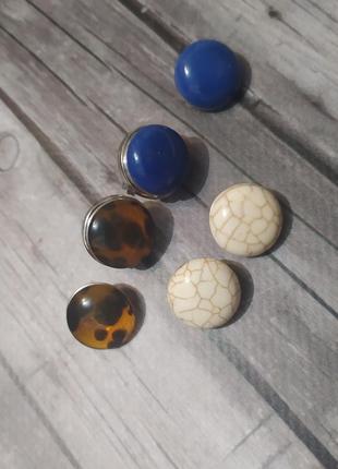 Клипсы со сменными кабронами на кнопках